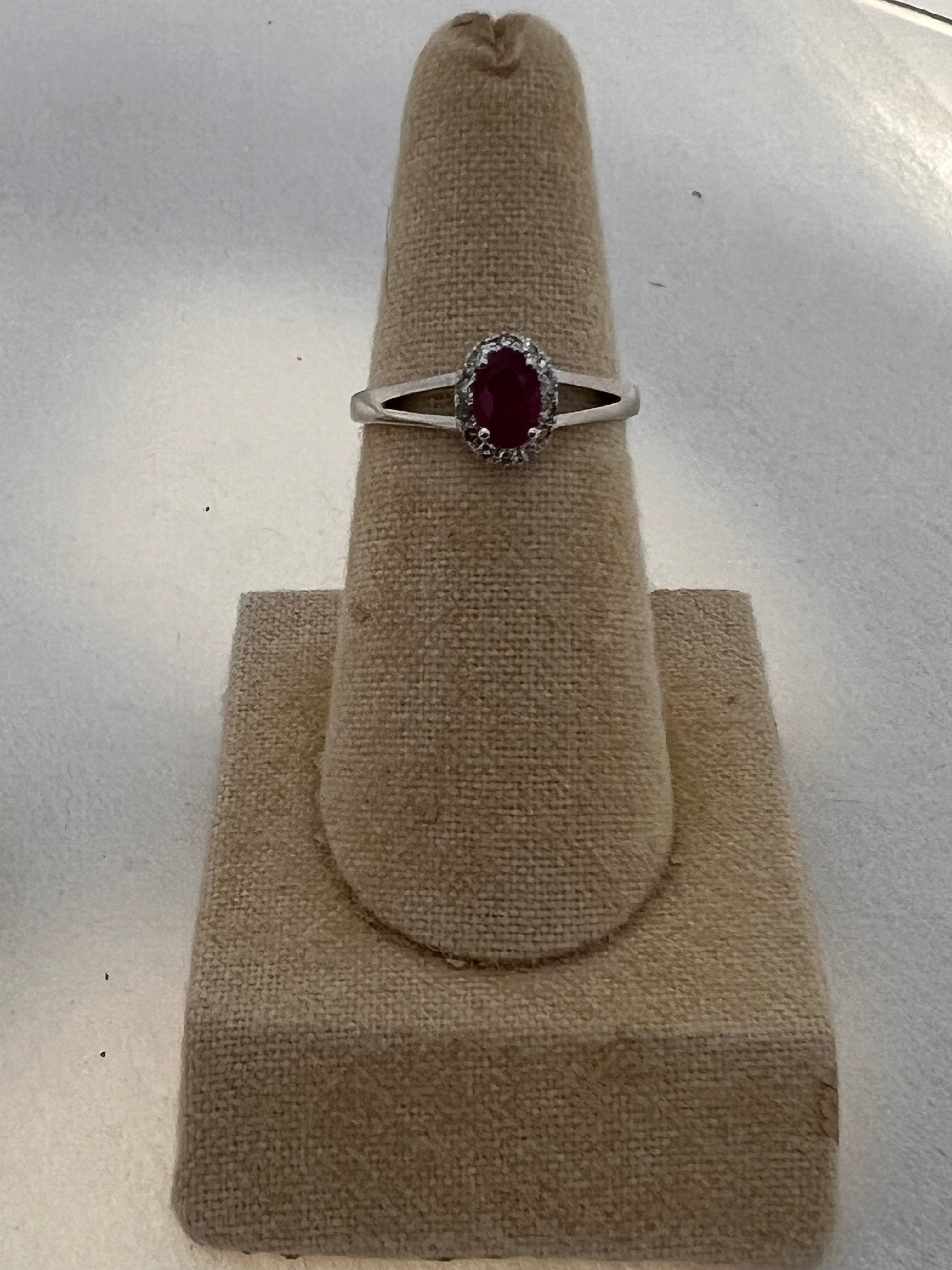 Oval Ruby & Diamond Halo Ring in 14kt White Gold
