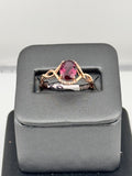 10K Rose Gold Oval Rhodolite Garnet & 0.05 CTW Diamond Accent Ring