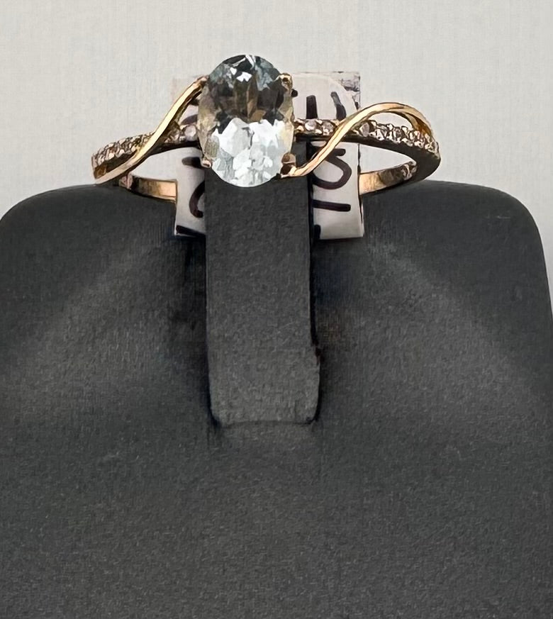 10K Yellow Gold Oval Aquamarine Ring with Diamond Swirl Accent
