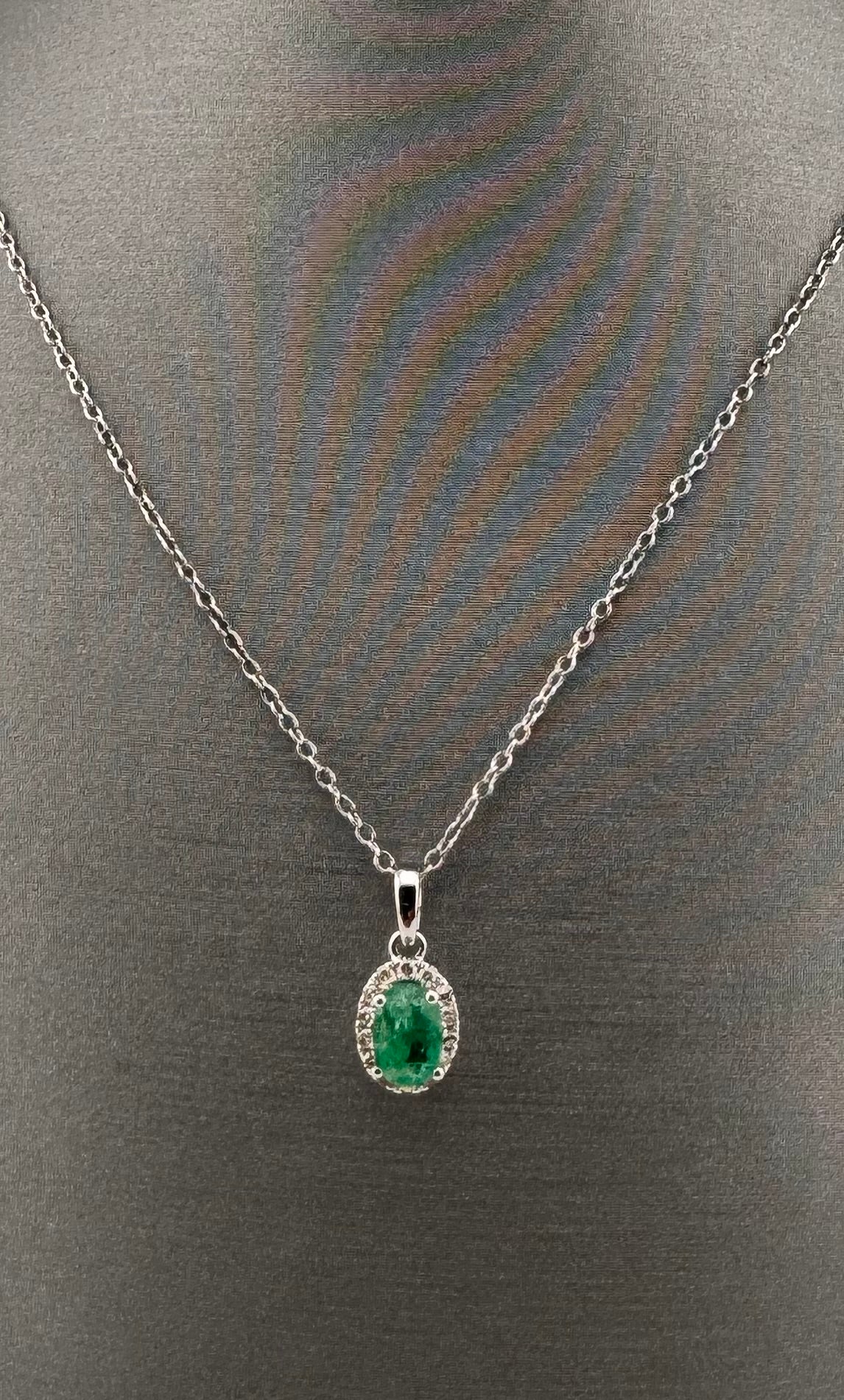 14K White Gold Oval Emerald & Diamond Halo Pendant | .66 ct Emerald, .10 ctw Diamonds