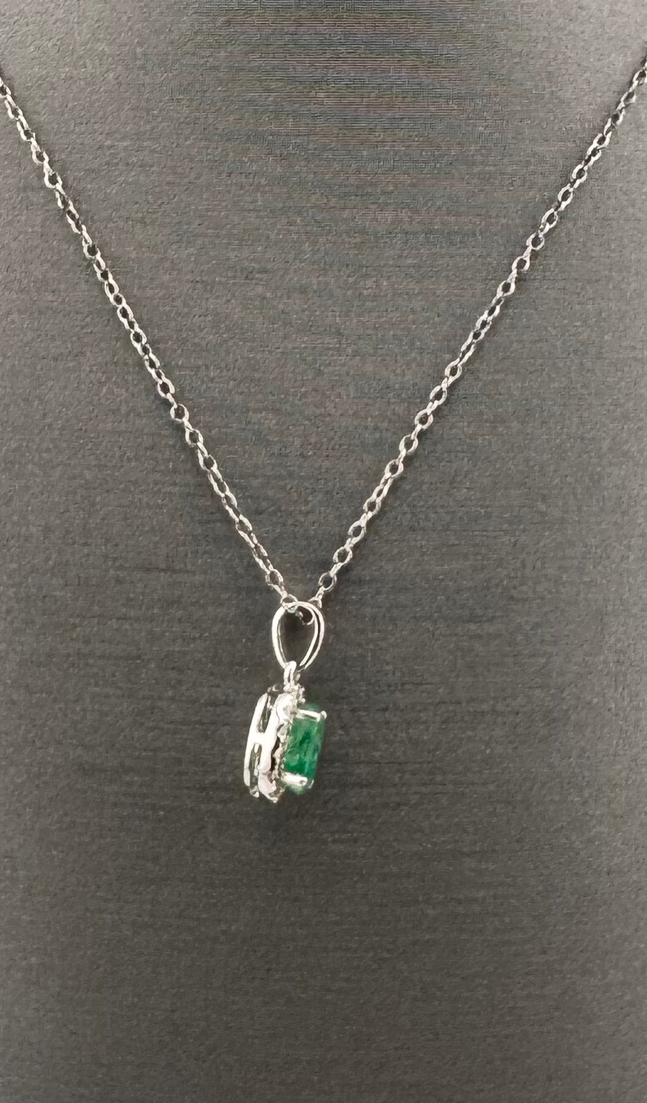 14K White Gold Oval Emerald & Diamond Halo Pendant | .20 ct Emerald, .05 ctw Diamonds
