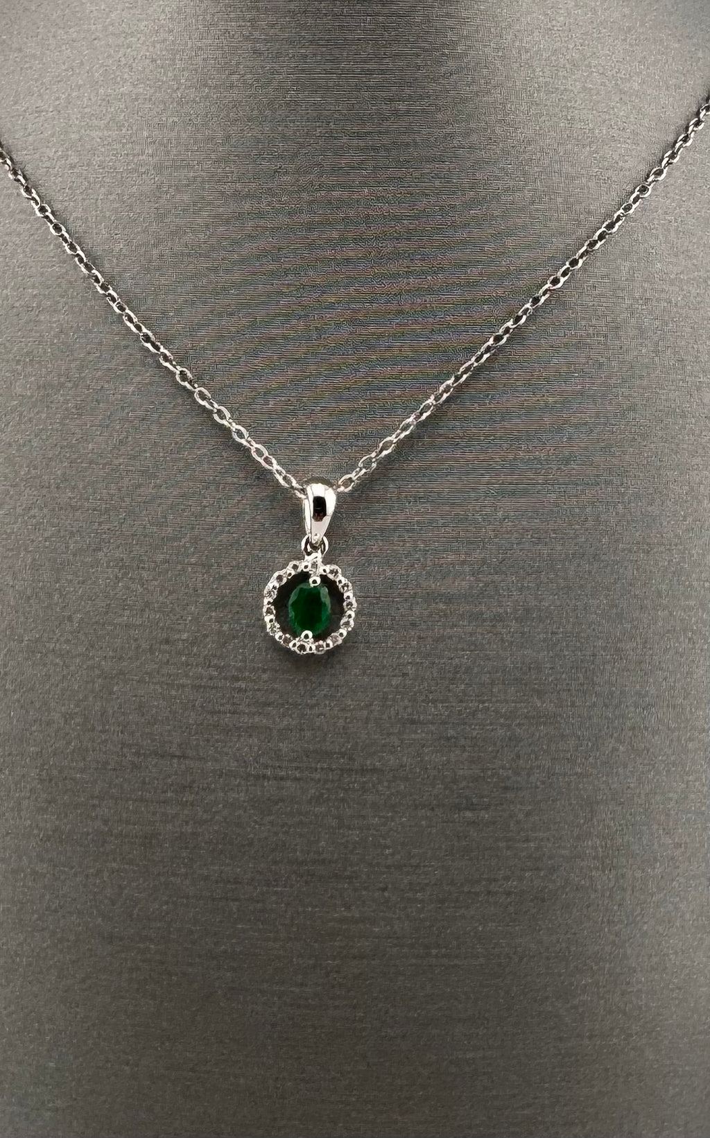 14K White Gold Oval Emerald & Diamond Halo Pendant | .20 ct Emerald, .05 ctw Diamonds