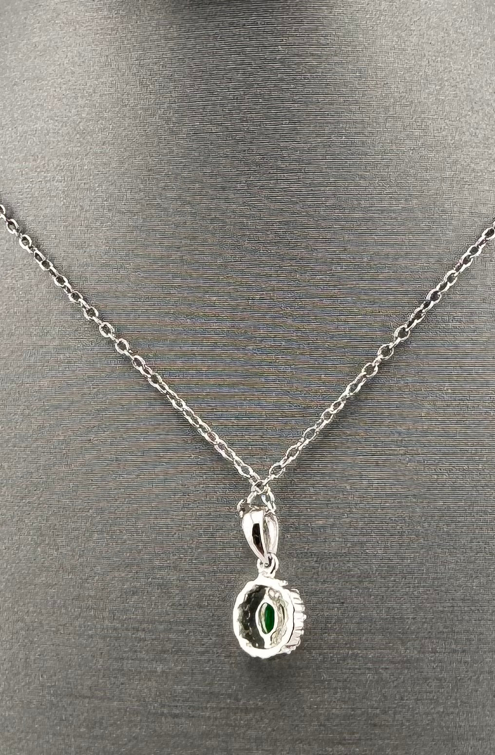 14K White Gold Oval Emerald & Diamond Halo Pendant | .20 ct Emerald, .05 ctw Diamonds
