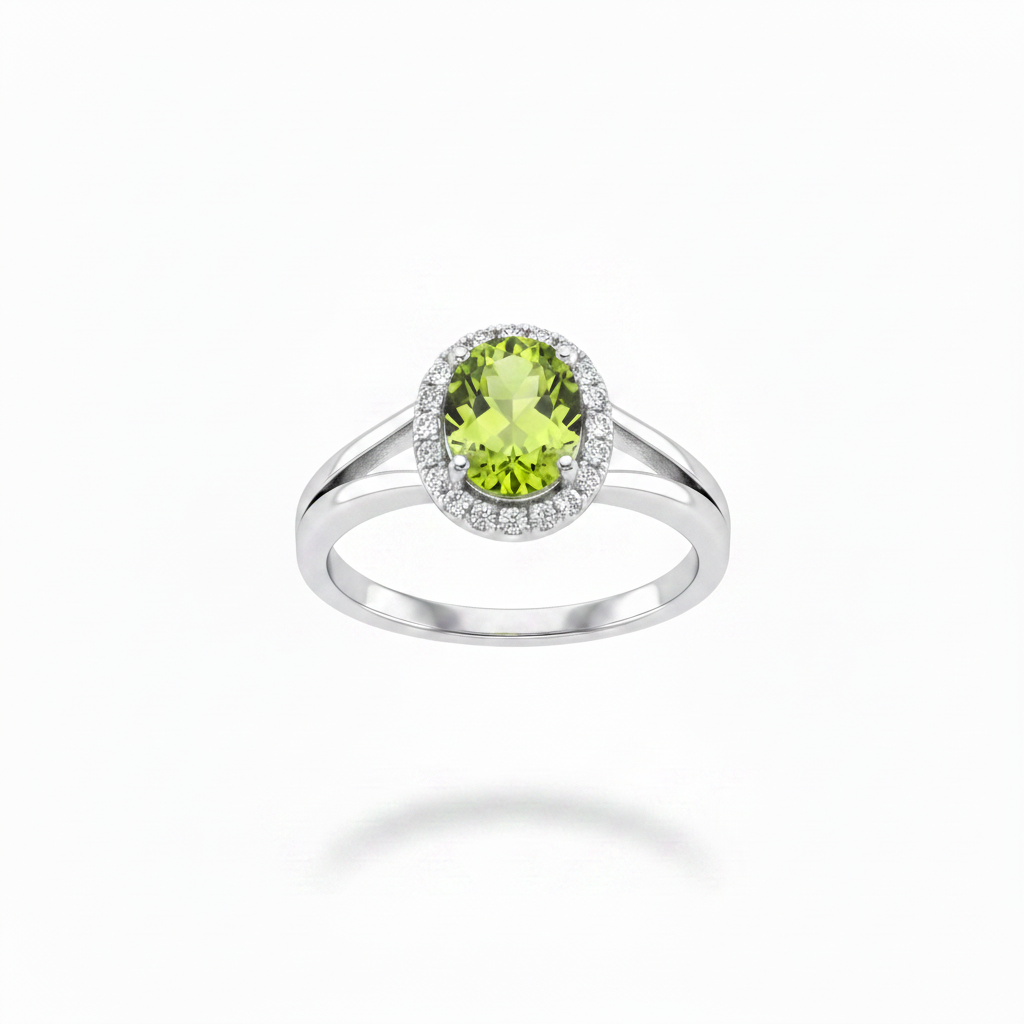14K white gold oval peridot and diamond halo ring with high polish plain split shank suspended on white background