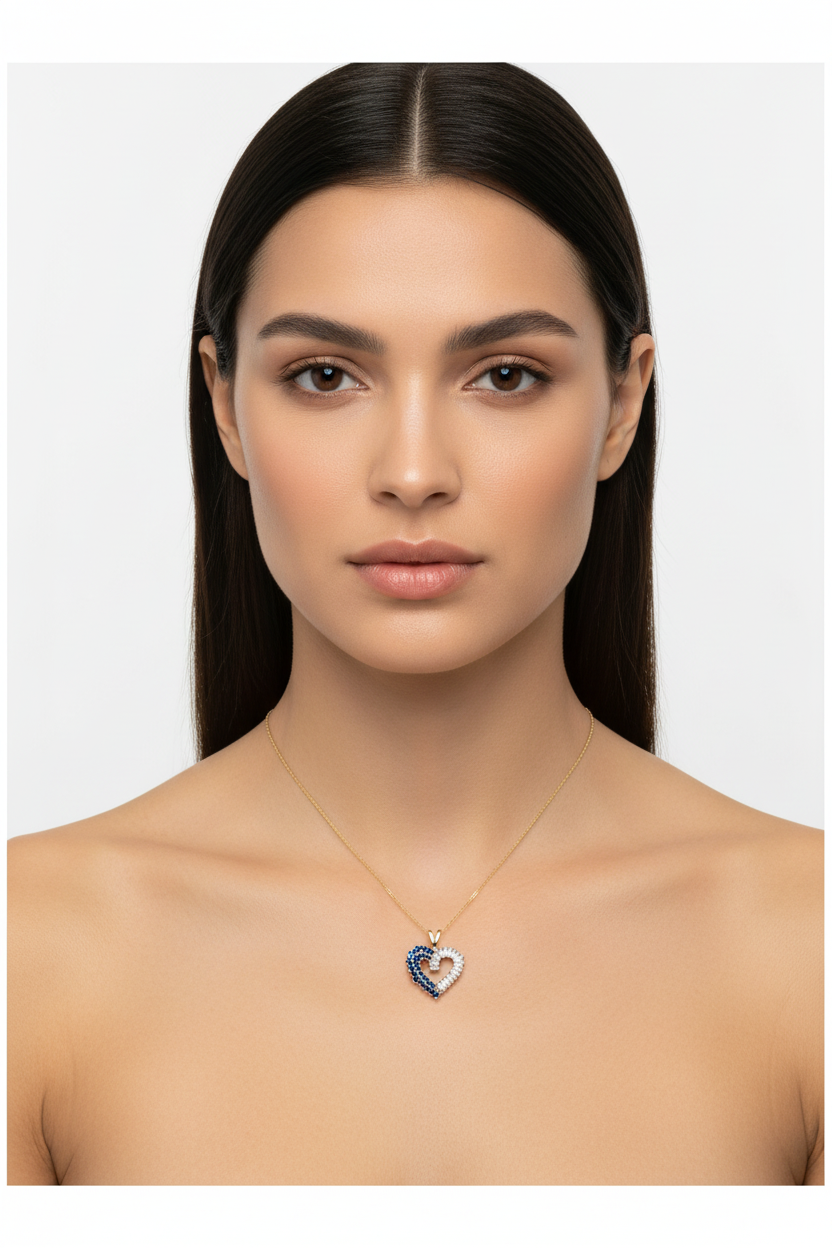 10K yellow gold blue sapphire and baguette diamond open heart pendant worn on model