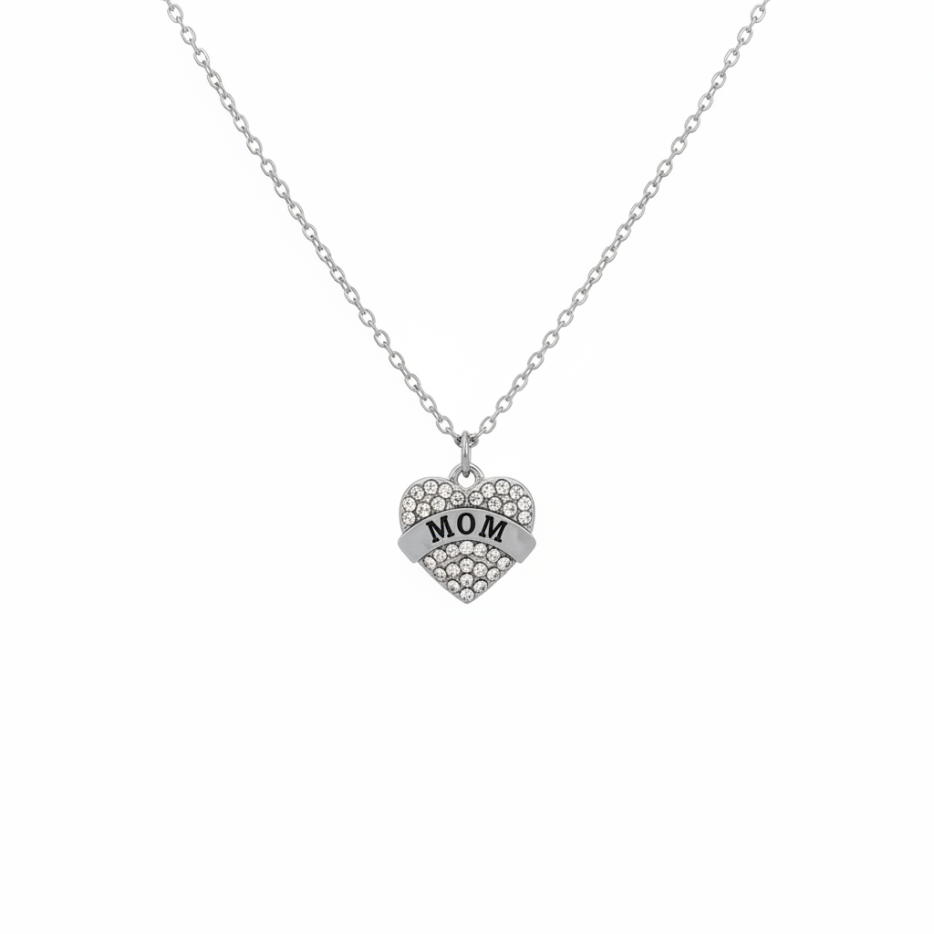 Silver-tone crystal pavé MOM heart pendant necklace with banner detail suspended on white background