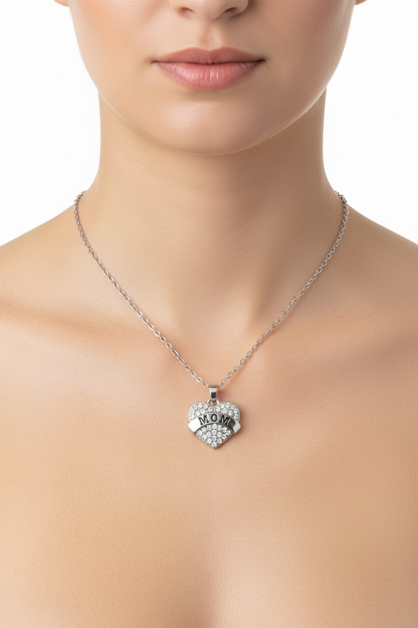 Silver-tone crystal pavé MOM heart pendant necklace with banner detail worn on model showing true to scale 18 inch length