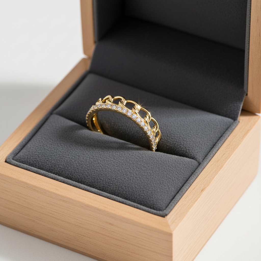 14K yellow gold chain link and micro-pavé diamond wedding band displayed in a luxury velvet ring box