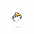 Oval citrine bezel set cocktail ring with sterling silver link chain band, suspended on white background