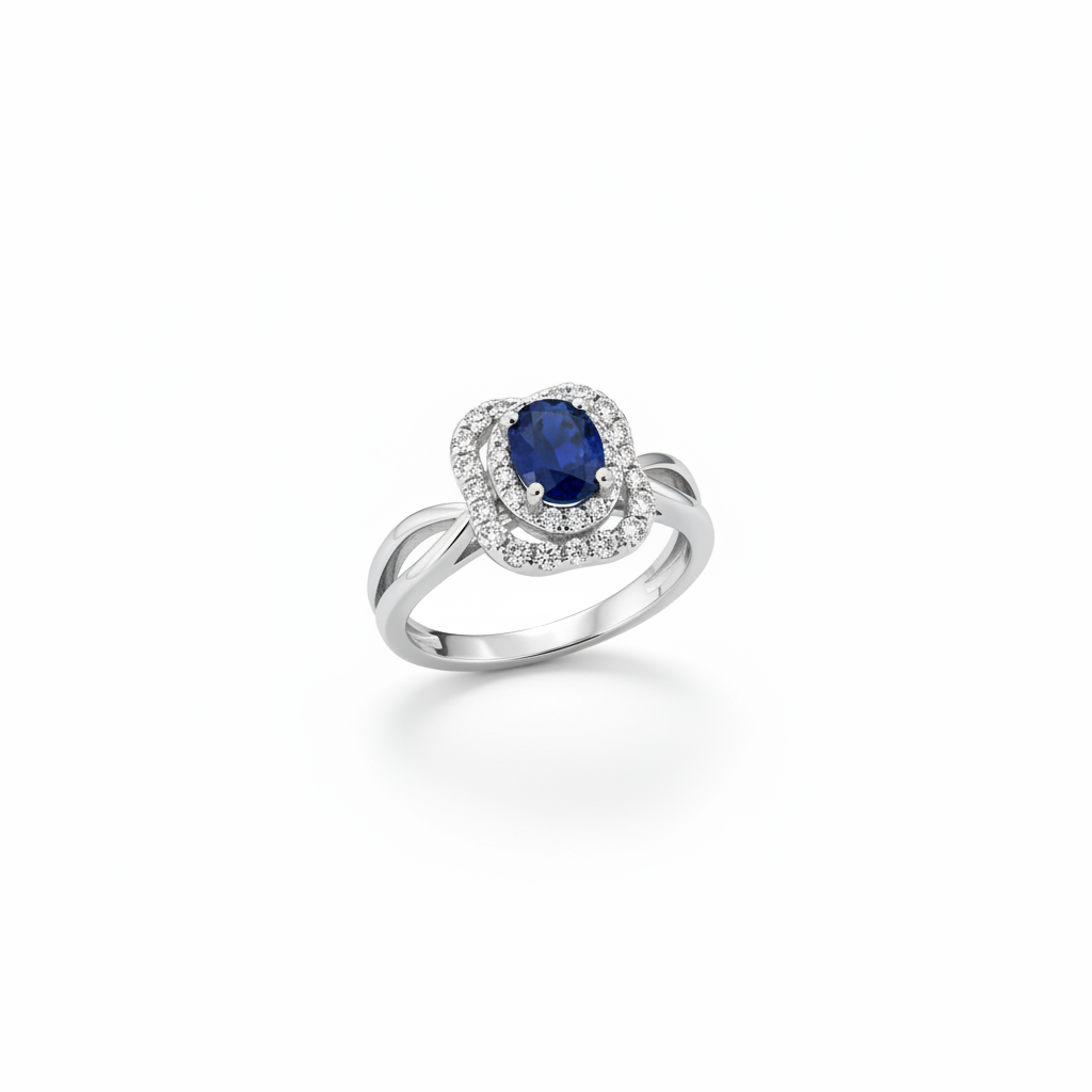 14K white gold oval blue sapphire double diamond halo ring with twisted split shank suspended on white background