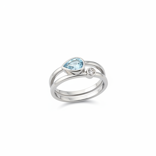 Jewelry item with blue center stone on clean white background