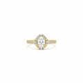 14K yellow gold oval halo engagement ring on white background