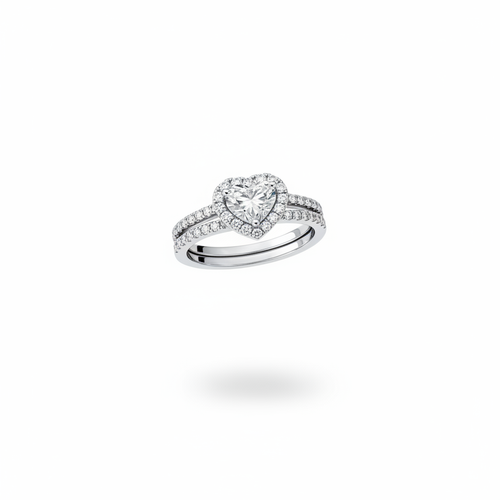 1.00ctw heart shaped diamond halo engagement ring in 14kt white gold suspended on white background