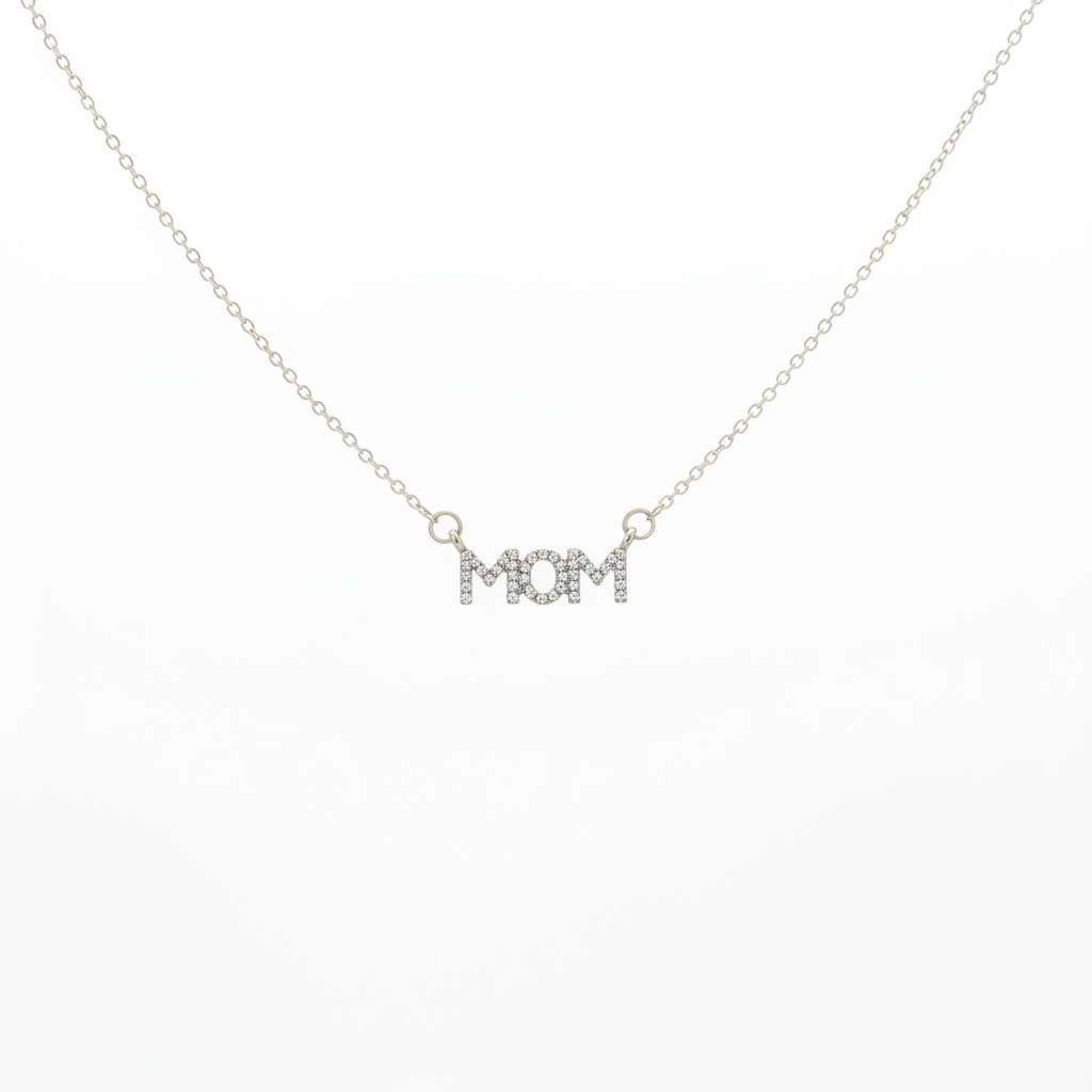 Silver-tone crystal pavé MOM letter bar necklace suspended on white background