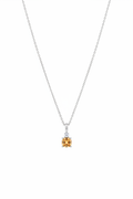 Cushion cut citrine and diamond pendant necklace suspended on white background, true to original piece