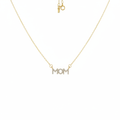 Gold-tone crystal pavé MOM letter bar necklace suspended on white background